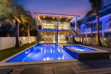 Welcome to your dream coastal retreat at 108 Magnolia Ave on the on Key Royale Club in Florida - for sale on GolfHomes.com, golf home, golf lot