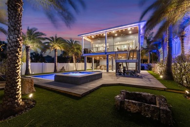 Welcome to your dream coastal retreat at 108 Magnolia Ave on the on Key Royale Club in Florida - for sale on GolfHomes.com, golf home, golf lot