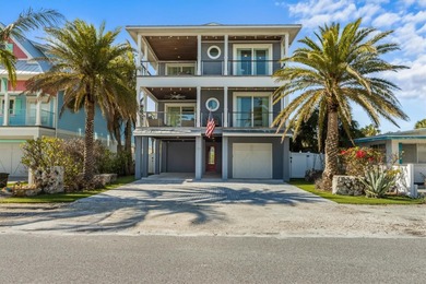Welcome to your dream coastal retreat at 108 Magnolia Ave on the on Key Royale Club in Florida - for sale on GolfHomes.com, golf home, golf lot