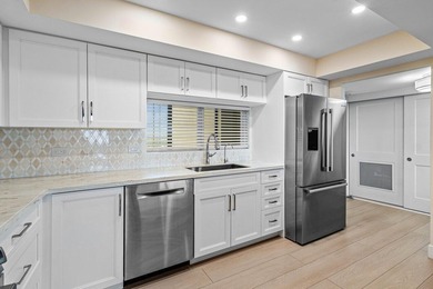 From the moment you enter, you're greeted by panoramic views of on The President Country Club in Florida - for sale on GolfHomes.com, golf home, golf lot