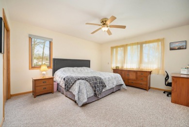 Beautifully updated contemporary ranch offering 3 possible 4 on Ridgeview Golf Course in Michigan - for sale on GolfHomes.com, golf home, golf lot