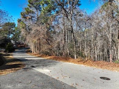 Begin your next chapter in the sought-after Pinehurst community on Pinehurst Resort and Country Club in North Carolina - for sale on GolfHomes.com, golf home, golf lot