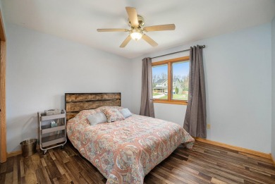 Beautifully updated contemporary ranch offering 3 possible 4 on Ridgeview Golf Course in Michigan - for sale on GolfHomes.com, golf home, golf lot
