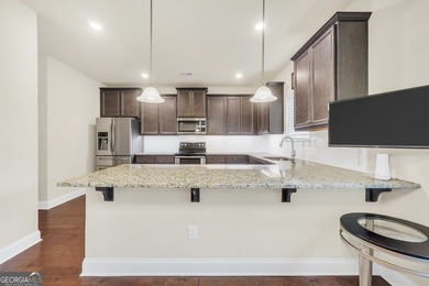 Immaculate, better-than-new 4-sided brick home built in 2020 on Canongate At Georgia National Golf Club in Georgia - for sale on GolfHomes.com, golf home, golf lot