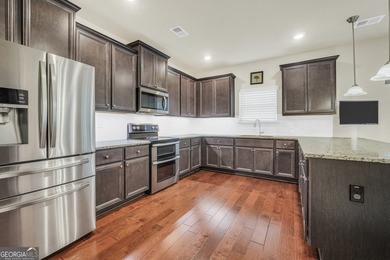 Immaculate, better-than-new 4-sided brick home built in 2020 on Canongate At Georgia National Golf Club in Georgia - for sale on GolfHomes.com, golf home, golf lot