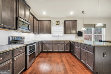 Immaculate, better-than-new 4-sided brick home built in 2020 on Canongate At Georgia National Golf Club in Georgia - for sale on GolfHomes.com, golf home, golf lot