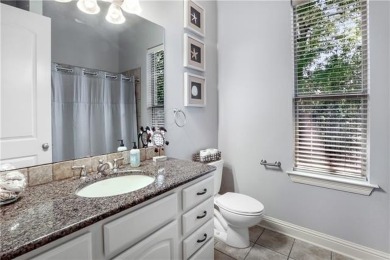 Welcome to 100 Chacahoula Lane, a classic French-style on Beau Chene Country Club in Louisiana - for sale on GolfHomes.com, golf home, golf lot