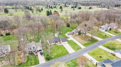 Beautifully updated contemporary ranch offering 3 possible 4 on Ridgeview Golf Course in Michigan - for sale on GolfHomes.com, golf home, golf lot