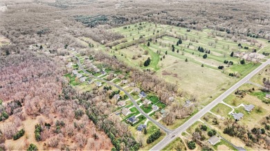 Beautifully updated contemporary ranch offering 3 possible 4 on Ridgeview Golf Course in Michigan - for sale on GolfHomes.com, golf home, golf lot