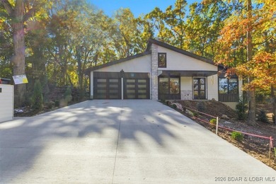 Welcome to this beautifully built contemporary home in the heart on The Club At Porto Cima in Missouri - for sale on GolfHomes.com, golf home, golf lot