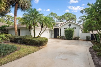 Nestled on a quiet, tree-lined street, this home has been nicely on Indian River Club in Florida - for sale on GolfHomes.com, golf home, golf lot