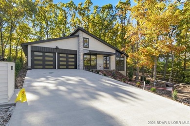 Welcome to this beautifully built contemporary home in the heart on The Club At Porto Cima in Missouri - for sale on GolfHomes.com, golf home, golf lot