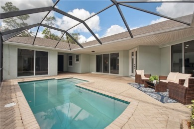 Nestled on a quiet, tree-lined street, this home has been nicely on Indian River Club in Florida - for sale on GolfHomes.com, golf home, golf lot