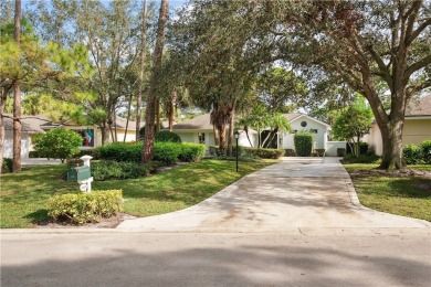 Nestled on a quiet, tree-lined street, this home has been nicely on Indian River Club in Florida - for sale on GolfHomes.com, golf home, golf lot