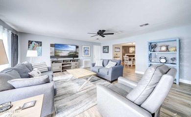 ***STUNNING REMODEL IN COLONY CLUB*** Discover modern elegance on Holiday Golf Club in Florida - for sale on GolfHomes.com, golf home, golf lot