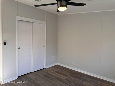 WOW! Move-in-ready and beautifully refreshed, this 2-bedroom on Barefoot Bay Golf Course in Florida - for sale on GolfHomes.com, golf home, golf lot