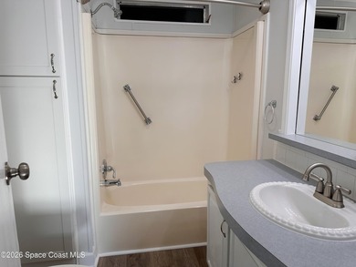 WOW! Move-in-ready and beautifully refreshed, this 2-bedroom on Barefoot Bay Golf Course in Florida - for sale on GolfHomes.com, golf home, golf lot