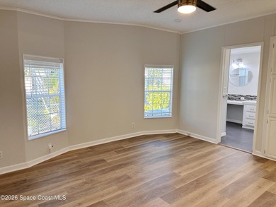 WOW! Move-in-ready and beautifully refreshed, this 2-bedroom on Barefoot Bay Golf Course in Florida - for sale on GolfHomes.com, golf home, golf lot