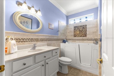 Discover this well-maintained 2 bedroom, 2 bath home plus a den on Eagle Ridge At Spruce Creek Country Club in Florida - for sale on GolfHomes.com, golf home, golf lot