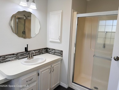 WOW! Move-in-ready and beautifully refreshed, this 2-bedroom on Barefoot Bay Golf Course in Florida - for sale on GolfHomes.com, golf home, golf lot