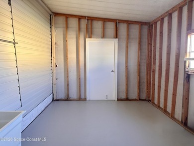 WOW! Move-in-ready and beautifully refreshed, this 2-bedroom on Barefoot Bay Golf Course in Florida - for sale on GolfHomes.com, golf home, golf lot