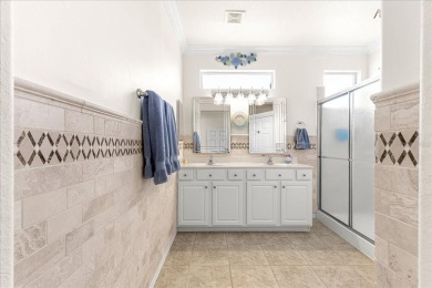 Discover this well-maintained 2 bedroom, 2 bath home plus a den on Eagle Ridge At Spruce Creek Country Club in Florida - for sale on GolfHomes.com, golf home, golf lot