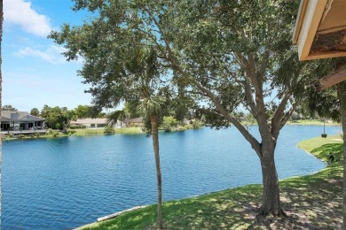 Welcome to your lakeside retreat in the heart of Plantation! on Jacaranda Golf Club in Florida - for sale on GolfHomes.com, golf home, golf lot