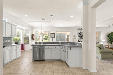 Discover this well-maintained 2 bedroom, 2 bath home plus a den on Eagle Ridge At Spruce Creek Country Club in Florida - for sale on GolfHomes.com, golf home, golf lot