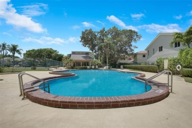 Welcome to your lakeside retreat in the heart of Plantation! on Jacaranda Golf Club in Florida - for sale on GolfHomes.com, golf home, golf lot