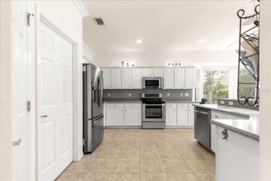 Discover this well-maintained 2 bedroom, 2 bath home plus a den on Eagle Ridge At Spruce Creek Country Club in Florida - for sale on GolfHomes.com, golf home, golf lot