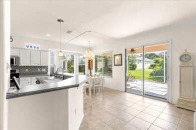 Discover this well-maintained 2 bedroom, 2 bath home plus a den on Eagle Ridge At Spruce Creek Country Club in Florida - for sale on GolfHomes.com, golf home, golf lot