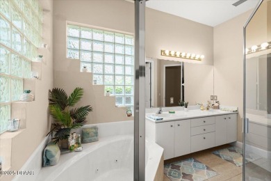 Welcome to this elegant 3-bedroom, 2-bath residence with an on Grand Haven Golf Club in Florida - for sale on GolfHomes.com, golf home, golf lot
