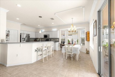 Discover this well-maintained 2 bedroom, 2 bath home plus a den on Eagle Ridge At Spruce Creek Country Club in Florida - for sale on GolfHomes.com, golf home, golf lot