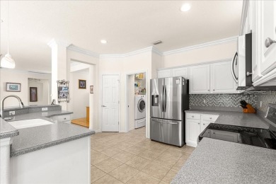 Discover this well-maintained 2 bedroom, 2 bath home plus a den on Eagle Ridge At Spruce Creek Country Club in Florida - for sale on GolfHomes.com, golf home, golf lot