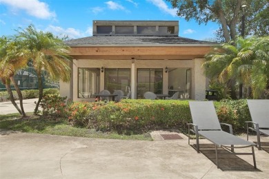 Welcome to your lakeside retreat in the heart of Plantation! on Jacaranda Golf Club in Florida - for sale on GolfHomes.com, golf home, golf lot