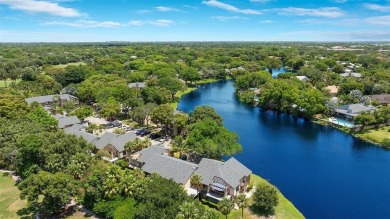 Welcome to your lakeside retreat in the heart of Plantation! on Jacaranda Golf Club in Florida - for sale on GolfHomes.com, golf home, golf lot