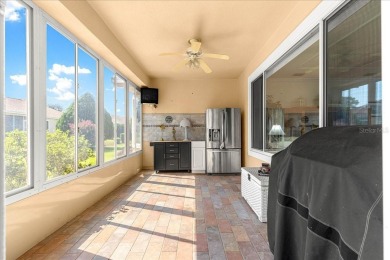 Discover this well-maintained 2 bedroom, 2 bath home plus a den on Eagle Ridge At Spruce Creek Country Club in Florida - for sale on GolfHomes.com, golf home, golf lot