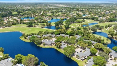 Welcome to your lakeside retreat in the heart of Plantation! on Jacaranda Golf Club in Florida - for sale on GolfHomes.com, golf home, golf lot