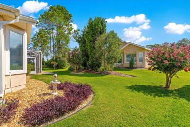 Discover this well-maintained 2 bedroom, 2 bath home plus a den on Eagle Ridge At Spruce Creek Country Club in Florida - for sale on GolfHomes.com, golf home, golf lot