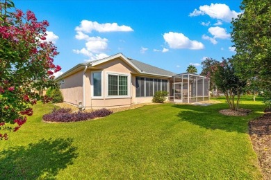 Discover this well-maintained 2 bedroom, 2 bath home plus a den on Eagle Ridge At Spruce Creek Country Club in Florida - for sale on GolfHomes.com, golf home, golf lot