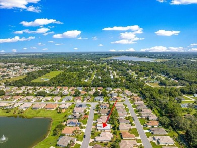 Discover this well-maintained 2 bedroom, 2 bath home plus a den on Eagle Ridge At Spruce Creek Country Club in Florida - for sale on GolfHomes.com, golf home, golf lot
