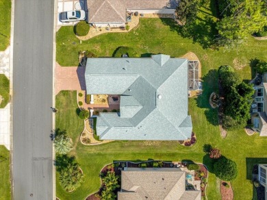 Discover this well-maintained 2 bedroom, 2 bath home plus a den on Eagle Ridge At Spruce Creek Country Club in Florida - for sale on GolfHomes.com, golf home, golf lot