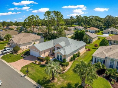 Discover this well-maintained 2 bedroom, 2 bath home plus a den on Eagle Ridge At Spruce Creek Country Club in Florida - for sale on GolfHomes.com, golf home, golf lot