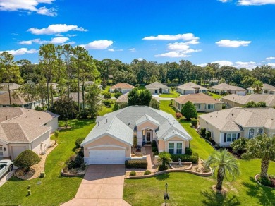 Discover this well-maintained 2 bedroom, 2 bath home plus a den on Eagle Ridge At Spruce Creek Country Club in Florida - for sale on GolfHomes.com, golf home, golf lot