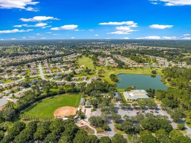Discover this well-maintained 2 bedroom, 2 bath home plus a den on Eagle Ridge At Spruce Creek Country Club in Florida - for sale on GolfHomes.com, golf home, golf lot