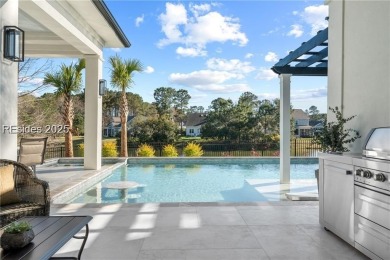 Experience effortless luxury in the heart of Bluffton's private on Hampton Hall Club in South Carolina - for sale on GolfHomes.com, golf home, golf lot
