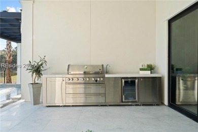 Experience effortless luxury in the heart of Bluffton's private on Hampton Hall Club in South Carolina - for sale on GolfHomes.com, golf home, golf lot