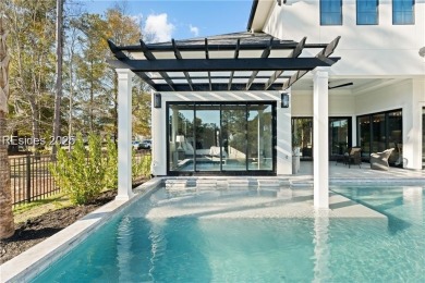 Experience effortless luxury in the heart of Bluffton's private on Hampton Hall Club in South Carolina - for sale on GolfHomes.com, golf home, golf lot