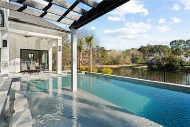 Experience effortless luxury in the heart of Bluffton's private on Hampton Hall Club in South Carolina - for sale on GolfHomes.com, golf home, golf lot