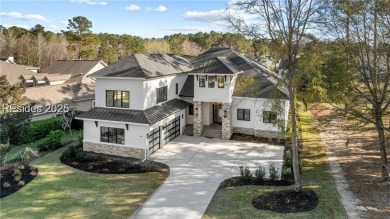 Experience effortless luxury in the heart of Bluffton's private on Hampton Hall Club in South Carolina - for sale on GolfHomes.com, golf home, golf lot